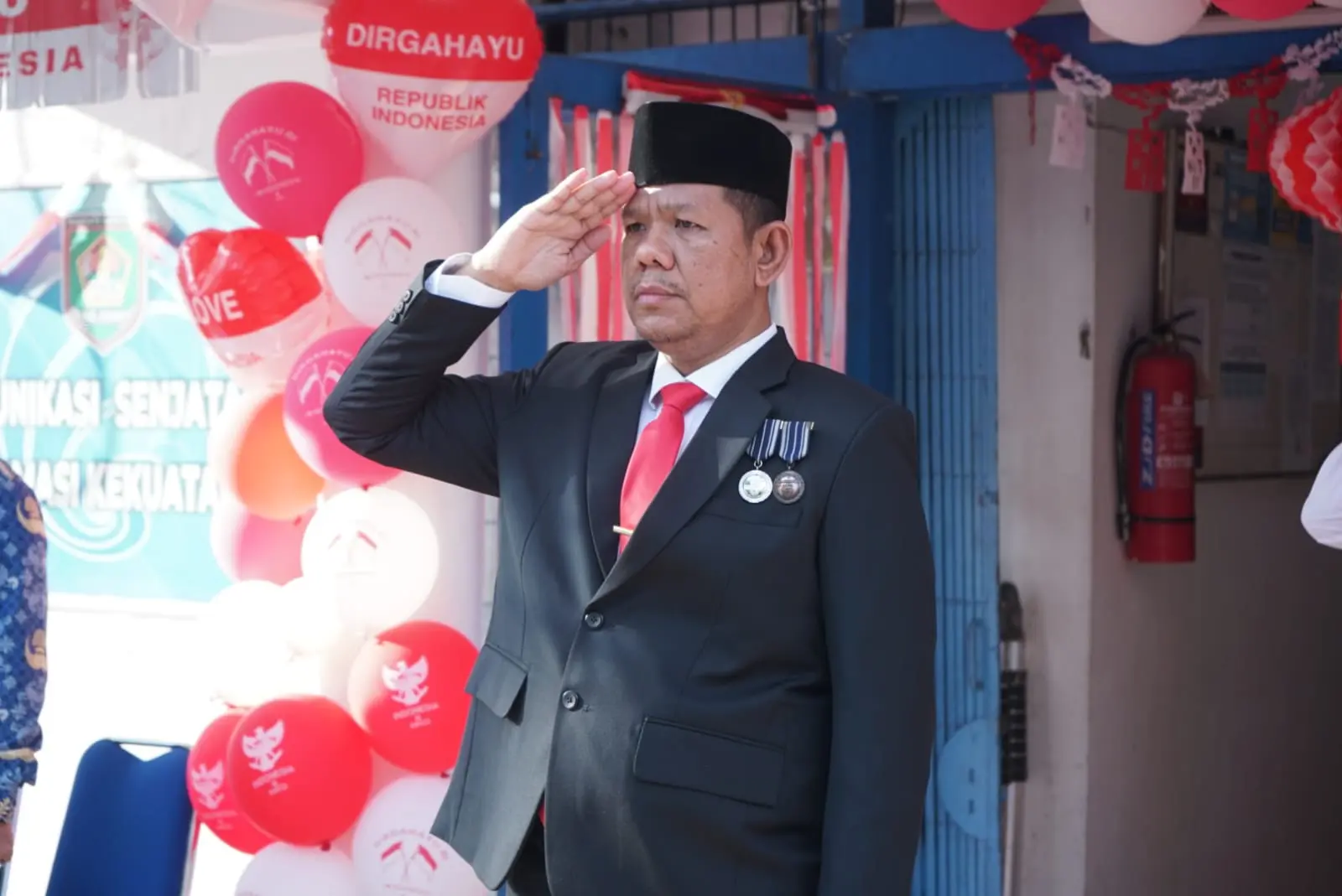  Upacara Pengibaran Bendera Merah Putih dalam rangka memperingati HUT ke-80 Kemerdekaan Republik Indonesia berlangsung khidmat di Halaman Kantor Dinas Komunikasi dan Informatika Kabupaten Asahan